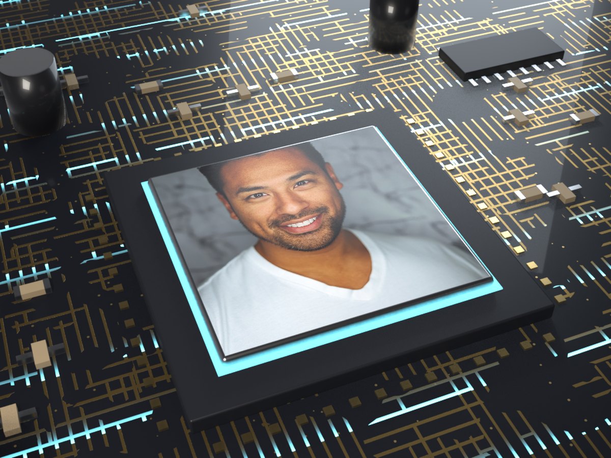 Circuit board GIF: a portrait printed on a chip lid, with cyan light running along gold traces on a black board