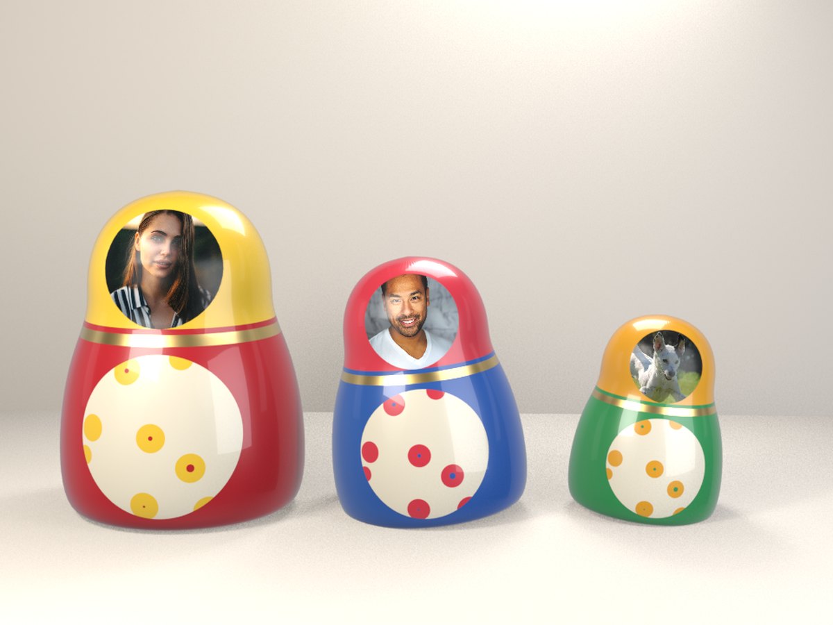 Nesting doll GIF: three painted dolls in a row with the faces of a woman, a man and a dog