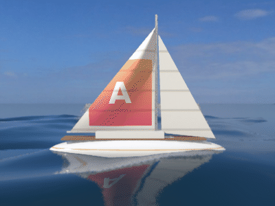 Sailboat with photo on sail and reflection