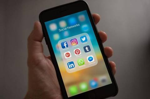 Social media apps on a smartphone screen